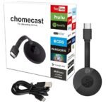 A black TV streaming device with an HDMI connector and USB cable placed beside its packaging box. The box shows multiple streaming platform logos like YouTube, Hulu, Netflix, and others, and has the text “chomecast TV streaming device” printed on it.