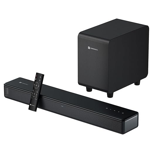 Portronics Sound Slick X 250W Bluetooth Soundbar with Wired Subwoofer & Remote | 2.1 Channel Home Theatre (Black) Black Portronics Sound Slick X Bluetooth soundbar with wired subwoofer and remote control placed beside the soundbar.