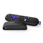 "Roku Express 4K+ streaming device with Roku Voice Remote placed beside it."