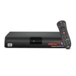 A black, rectangular Dish TV Smart+ HD Set Top Box with a green indicator light and the 'dishtv' logo on the front, shown next to its matching black remote control.